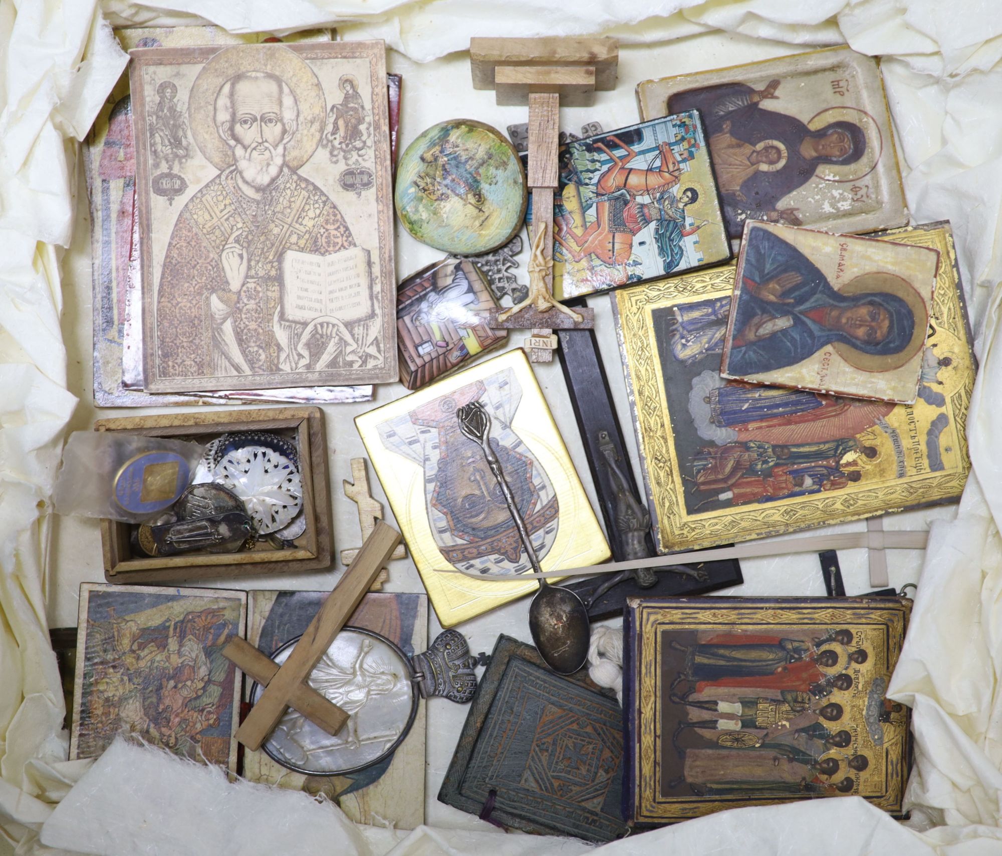 A quantity of religious artefacts including icons, crucifixes, etc.